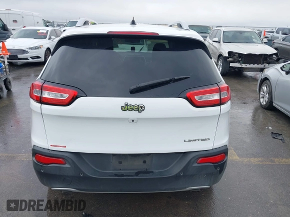 2014 Jeep Cherokee Limited with VIN 1C4PJLDS9EW225899, listed as a IAAI auction lot 41570392 with 226,226 mi miles. Bid and sale history available at carsss.com. Image 16.
