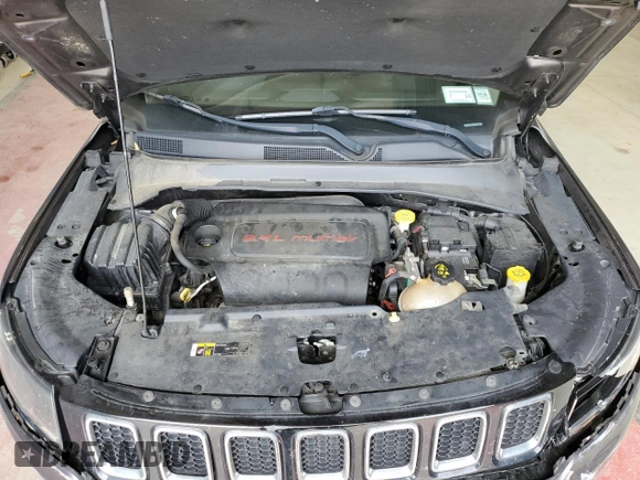 2018 Jeep Compass Altitude with VIN 3C4NJDBB9JT457242, listed as a Copart auction lot 60886385 with 143,467 mi miles and Salvage title. Bid and sale history available at DreamBid. Image 12.