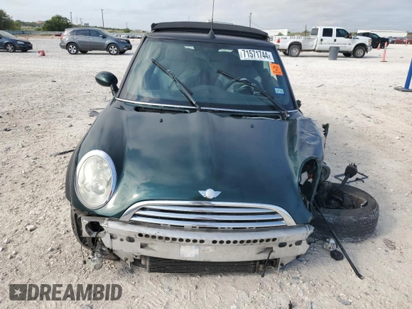 2007 MINI Convertible with VIN WMWRF33567TF66784, listed as a Copart auction lot 71571744 with 115,008 mi miles and Salvage Title. Bid and sale history available at DreamBid. Image 5.