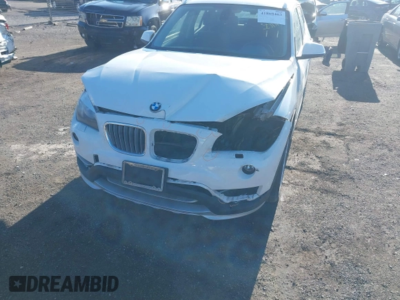 2015 BMW X1 xDrive28i z VIN WBAVL1C57FVY25598, wystawiony jako IAAI lot #41860463 z przebiegiem Nie podano mil oraz . Historia ofert i sprzedaży dostępna na DreamBid. Obrazek 6.
