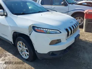 2015 Jeep Cherokee Latitude with VIN 1C4PJLCBXFW506502, listed as a IAAI auction lot 42103117 with 160,433 mi miles and . Bid and sale history available at carsss.com. Image 18.