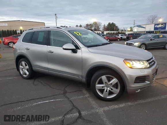 2012 Volkswagen Touareg with VIN WVGFG9BPXCD004442, listed as a Copart auction lot 41466935 with 98,956 mi miles and Clean title. Bid and sale history available at DreamBid. Image 4.