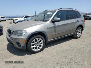 2011 BMW X5 35i z VIN 5UXZV4C52BL403095, wystawiony jako Copart lot #60177735 z przebiegiem 166 553 mil mil oraz Czysty tytuł • Clean title. Historia ofert i sprzedaży dostępna na DreamBid. Obrazek 1.