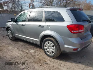 2019 Dodge Journey SE with VIN 3C4PDCBB0KT719211, listed as a IAAI auction lot 41823499 with 151,569 mi miles and . Bid and sale history available at DreamBid. Image 3.