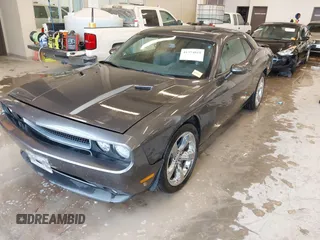 2013 Dodge Challenger SXT z VIN 2C3CDYAG9DH629189, wystawiony jako IAAI lot #41374015 z przebiegiem Nie podano mil oraz . Historia ofert i sprzedaży dostępna na DreamBid. Obrazek 2.