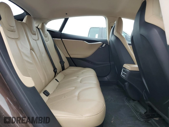 2014 Tesla Model S 60 with VIN 5YJSA1H19EFP51003, listed as a Copart auction lot 52164335 with 105,926 mi miles and Salvage Title. Bid and sale history available at DreamBid. Image 10.