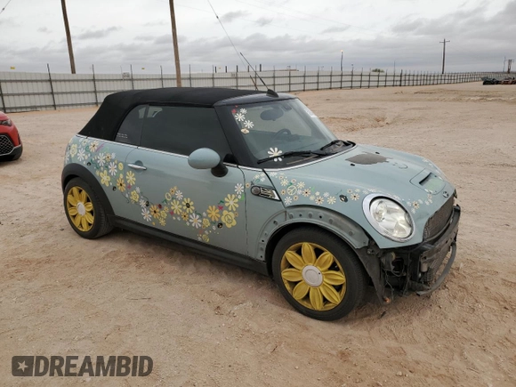 2014 MINI Convertible S with VIN WMWZP3C56ET707425, listed as a Copart auction lot 50894965 with 100,116 mi miles and Salvage Title. Bid and sale history available at DreamBid. Image 4.