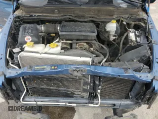 2006 Dodge 1500 SLT z VIN 1D7HA18N56S649415, wystawiony jako Copart lot #55862295 z przebiegiem 156 660 mil mil oraz Szkoda całkowita • Salvage title. Historia ofert i sprzedaży dostępna na DreamBid. Obrazek 11.