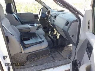 2005 Ford F-150 STX with VIN 1FTRX14W95FB53021, listed as a IAAI auction lot 42138458 with 150,885 mi miles. Bid and sale history available at carsss.com. Image 5.