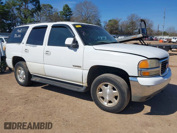 2002 GMC Yukon SLT with VIN 1GKEC13Z02J244875, listed as a IAAI auction lot 41657514 with 329,288 mi miles. Bid and sale history available at carsss.com. Image 1.