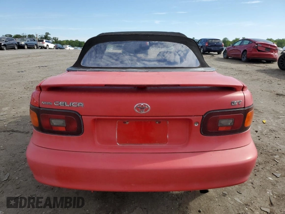 1992 Toyota Celica z VIN JT5ST87K7N0120192, wystawiony jako Copart lot #56216225 z przebiegiem 164 545 mil mil oraz Tytuł czysty. Historia ofert i sprzedaży dostępna na DreamBid. Obrazek 6.