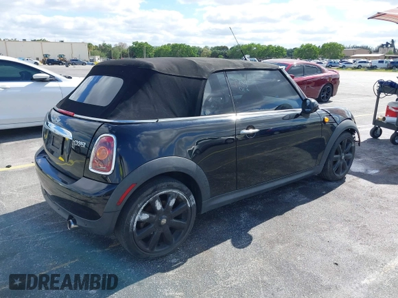 2010 MINI Convertible with VIN WMWMR3C54ATU96904, listed as a IAAI auction lot 39151247 with 109,019 mi miles and . Bid and sale history available at DreamBid. Image 4.