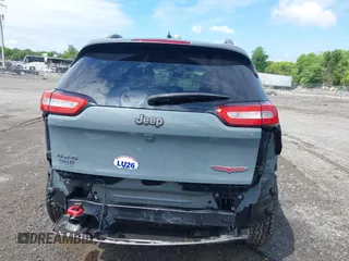2014 Jeep Cherokee Trailhawk z VIN 1C4PJMBS4EW236950, wystawiony jako IAAI lot #42636128 z przebiegiem 170 491 mil mil oraz . Historia ofert i sprzedaży dostępna na DreamBid. Obrazek 17.