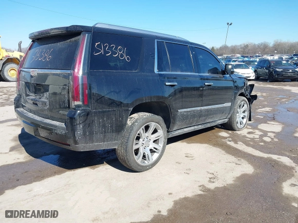2017 Cadillac Escalade Premium Luxury with VIN 1GYS4CKJXHR133970, listed as a IAAI auction lot 41666038 with 100,269 mi miles. Bid and sale history available at carsss.com. Image 4.