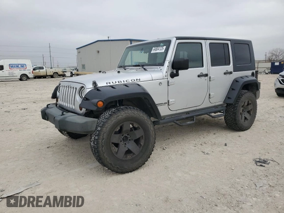 2009 Jeep Wrangler Unlimited Rubicon with VIN 1J8GA69169L731787, listed as a Copart auction lot 44604125 with 180,861 mi miles and Salvage title. Bid and sale history available at DreamBid. Image 1.