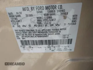 2007 Ford Edge SE z VIN 2FMDK36CX7BB02957, wystawiony jako IAAI lot #42278851 z przebiegiem 159 774 mil mil oraz . Historia ofert i sprzedaży dostępna na DreamBid. Obrazek 9.