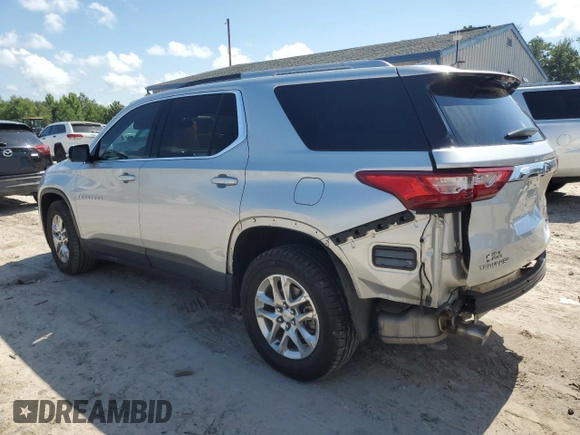 2018 Chevrolet Traverse LT Cloth with VIN 1GNERGKW7JJ282002, listed as a Copart auction lot 61564495 with 105,048 mi miles and Salvage title. Bid and sale history available at DreamBid. Image 2.