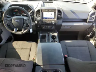 2020 Ford F-150 XL with VIN 1FTEW1CP0LFA72448, listed as a Copart auction lot 59237885 with 87,060 mi miles and Salvage title. Bid and sale history available at DreamBid. Image 8.