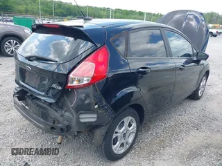 2016 Ford Fiesta SE with VIN 3FADP4EJ2GM150453, listed as a IAAI auction lot 42104235 with 124,423 mi miles and . Bid and sale history available at carsss.com. Image 4.