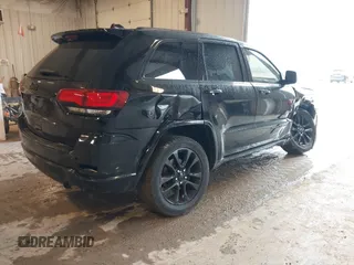 2017 Jeep Grand Cherokee Laredo with VIN 1C4RJFAG3HC841307, listed as a IAAI auction lot 42326035 with 132,655 mi miles and . Bid and sale history available at DreamBid. Image 4.