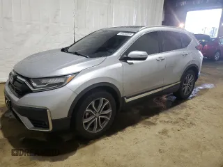 2020 Honda CR-V Touring z VIN 2HKRW2H92LH617010, wystawiony jako Copart lot #56938805 z przebiegiem 57 276 mil mil oraz Szkoda całkowita • Salvage title. Historia ofert i sprzedaży dostępna na DreamBid. Obrazek 1.