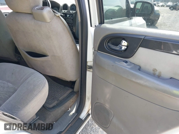 2007 GMC Envoy SLE with VIN 1GKDS13S772142847, listed as a IAAI auction lot 41605904 with 131,564 mi miles. Bid and sale history available at carsss.com. Image 8.