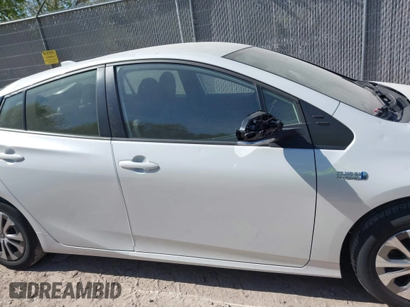 2022 Toyota Prius LE z VIN JTDKAMFP3N3202936, wystawiony jako IAAI lot #42238577 z przebiegiem 38 065 mil mil oraz . Historia ofert i sprzedaży dostępna na DreamBid. Obrazek 13.