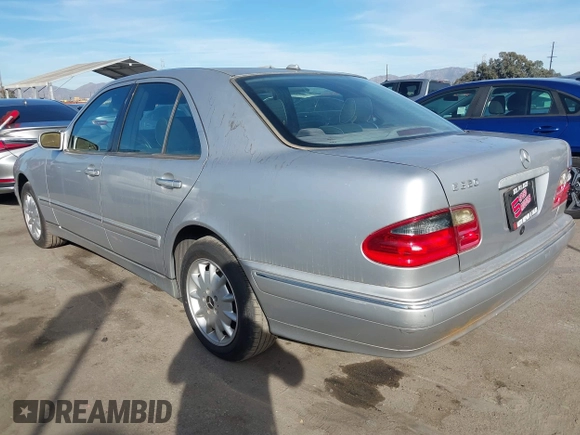 2002 Mercedes-Benz E-Class with VIN WDBJF65J72B485024, listed as a IAAI auction lot 41433088 with 100,100 mi miles. Bid and sale history available at carsss.com. Image 3.