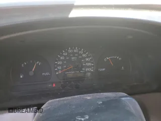 1999 Nissan Frontier XE with VIN 1N6DD26S3XC326231, listed as a Copart auction lot 51710615 with 228,174 mi miles and Salvage title. Bid and sale history available at DreamBid. Image 9.