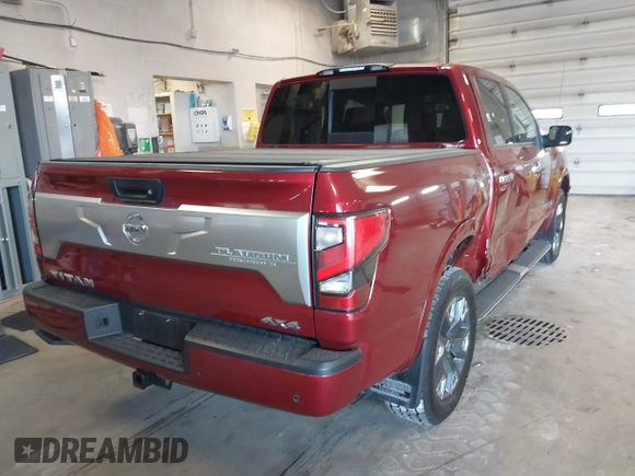 2021 Nissan Titan Pro-4X with VIN 1N6AA1ED9MN525986, listed as a IAAI auction lot 41795296 with 34,395 mi miles and . Bid and sale history available at DreamBid. Image 4.