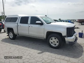 2017 Chevrolet Silverado 1500 LT with VIN 3GCUKREC3HG320455, listed as a Copart auction lot 57124395 with 119,683 mi miles and Salvage Title. Bid and sale history available at DreamBid. Image 4.