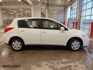 2009 Nissan Versa 1.8 S with VIN 3N1BC13E69L386083, listed as a IAAI auction lot 41717999 with 99,511 mi miles. Bid and sale history available at carsss.com. Image 14.