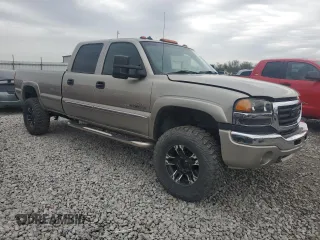 2003 GMC Sierra 2500HD SLT z VIN 1GTHK23183F142482, wystawiony jako Copart lot #51675765 z przebiegiem 198 316 mil mil oraz Szkoda całkowita • Salvage title. Historia ofert i sprzedaży dostępna na DreamBid. Obrazek 4.