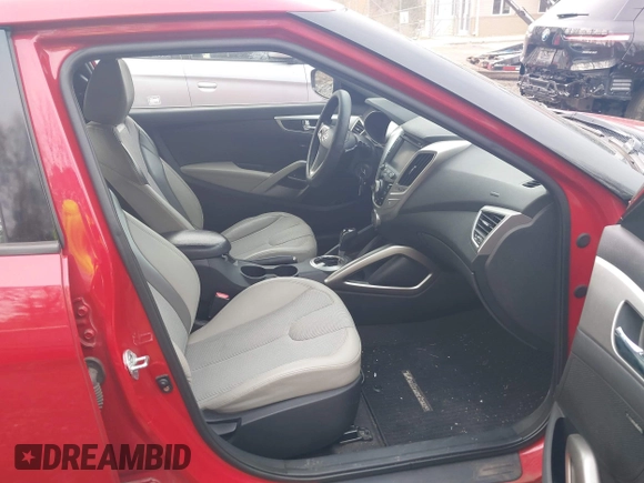2012 Hyundai Veloster w/Black Int z VIN KMHTC6AD4CU072868, wystawiony jako IAAI lot #42029030 z przebiegiem 112 817 mil mil oraz . Historia ofert i sprzedaży dostępna na DreamBid. Obrazek 5.
