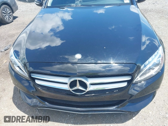 2015 Mercedes-Benz C 300 Luxury with VIN 55SWF4KB9FU024918, listed as a IAAI auction lot 42210608 with 74,445 mi miles and . Bid and sale history available at carsss.com. Image 6.