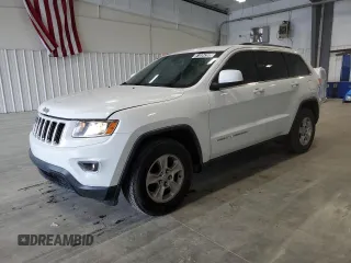 2014 Jeep Grand Cherokee Laredo with VIN 1C4RJEAG1EC243223, listed as a Copart auction lot 51534395 with 195,357 mi miles and Clean Title. Bid and sale history available at DreamBid. Image 1.