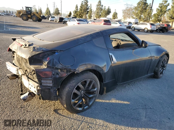 2015 Nissan 370Z with VIN JN1AZ4EH8FM444456, listed as a Copart auction lot 67407134 with 58,513 mi miles and Salvage Title. Bid and sale history available at carsss.com. Image 3.