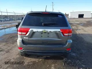 2011 Jeep Grand Cherokee 70th Anniversary with VIN 1J4RR4GT6BC715848, listed as a IAAI auction lot 41562152 with 119,910 mi miles. Bid and sale history available at carsss.com. Image 16.