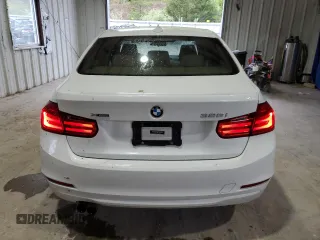 2013 BMW 3 Series 328i xDrive with VIN WBA3B3C58DF542088, listed as a Copart auction lot 52076465 with 85,222 mi miles and Salvage Title. Bid and sale history available at DreamBid. Image 6.