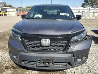 2019 Honda Passport EX-L with VIN 5FNYF7H58KB003906, listed as a Copart auction lot 46312795 with 59,417 mi miles and Salvage Title. Bid and sale history available at carsss.com. Image 5.