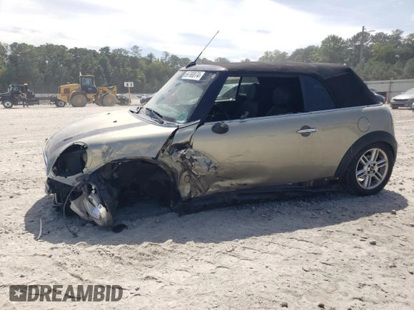2011 MINI Convertible with VIN WMWZN3C54BT133246, listed as a Copart auction lot 69780074 with 176,955 mi miles and Salvage title. Bid and sale history available at DreamBid. Image 1.