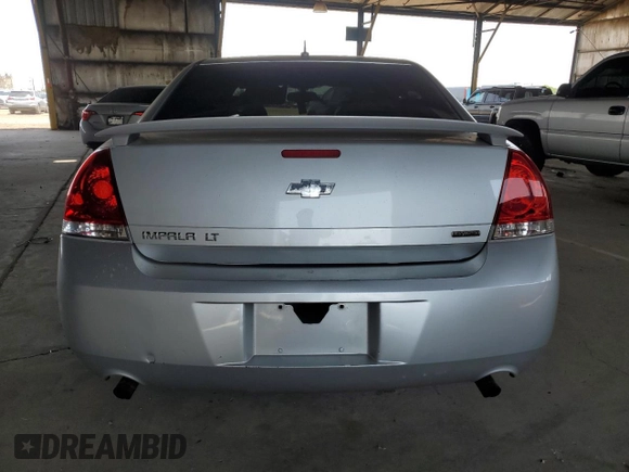 2014 Chevrolet Impala LT with VIN 2G1WB5E3XE1103306, listed as a Copart auction lot 63231005 with 163,901 mi miles and Salvage title. Bid and sale history available at DreamBid. Image 6.
