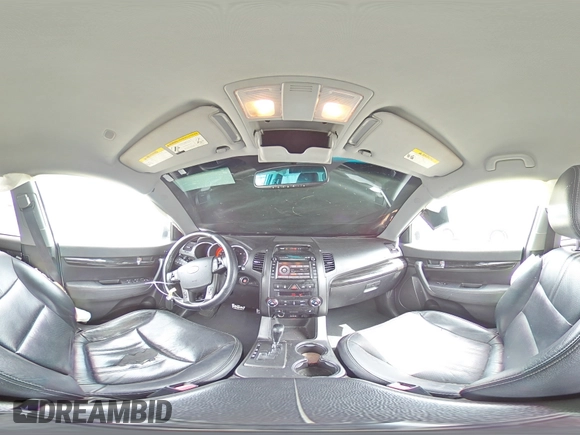 2012 Kia Sorento SX z VIN 5XYKWDA25CG280219, wystawiony jako Copart lot #54397025 z przebiegiem 197 685 mil mil oraz Szkoda całkowita • Salvage title. Historia ofert i sprzedaży dostępna na DreamBid. Obrazek 14.