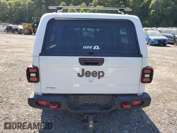 2023 Jeep Gladiator Rubicon with VIN 1C6JJTBG9PL546437, listed as a Copart auction lot 62536575 with 14,106 mi miles and Salvage title. Bid and sale history available at DreamBid. Image 6.