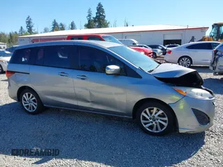 2014 Mazda 5 Sport z VIN JM1CW2BL0E0172678, wystawiony jako IAAI lot #42192057 z przebiegiem 89 848 mil mil oraz . Historia ofert i sprzedaży dostępna na DreamBid. Obrazek 13.