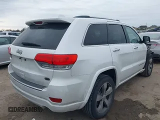 2014 Jeep Grand Cherokee Overland with VIN 1C4RJECG3EC266659, listed as a IAAI auction lot 41363419 with 142,896 mi miles. Bid and sale history available at carsss.com. Image 4.