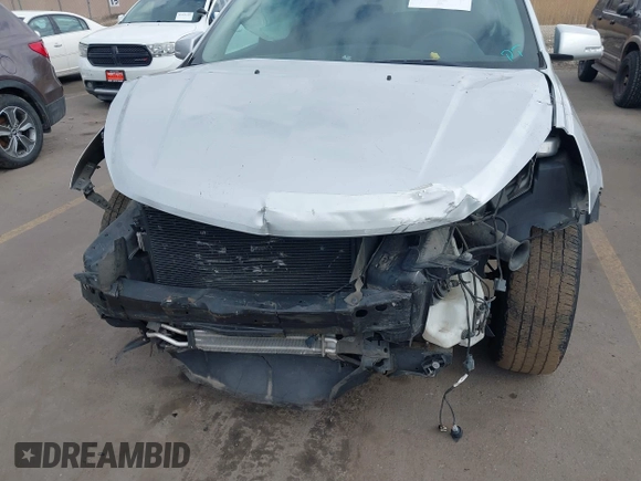 2013 Chevrolet Traverse LT with VIN 1GNKVGKD6DJ240146, listed as a IAAI auction lot 41665024 with 118,648 mi miles and . Bid and sale history available at DreamBid. Image 6.