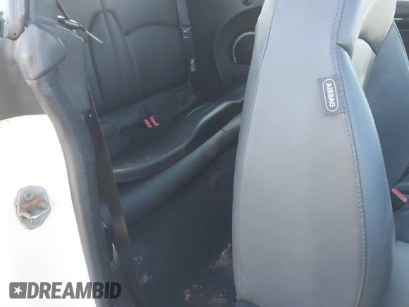 2011 MINI Convertible S with VIN WMWZP3C54BTX82748, listed as a IAAI auction lot 41817396 with 113,458 mi miles and . Bid and sale history available at DreamBid. Image 8.