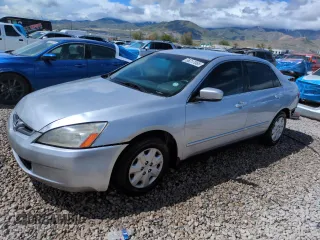 2004 Honda Accord LX with VIN 1HGCM56324A067460, listed as a Copart auction lot 56217065 with 215,231 mi miles and Salvage title. Bid and sale history available at DreamBid. Image 1.