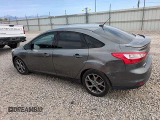 2013 Ford Focus SE with VIN 1FADP3F24DL189897, listed as a Copart auction lot 61970155 with 212,218 mi miles and Salvage title. Bid and sale history available at DreamBid. Image 2.